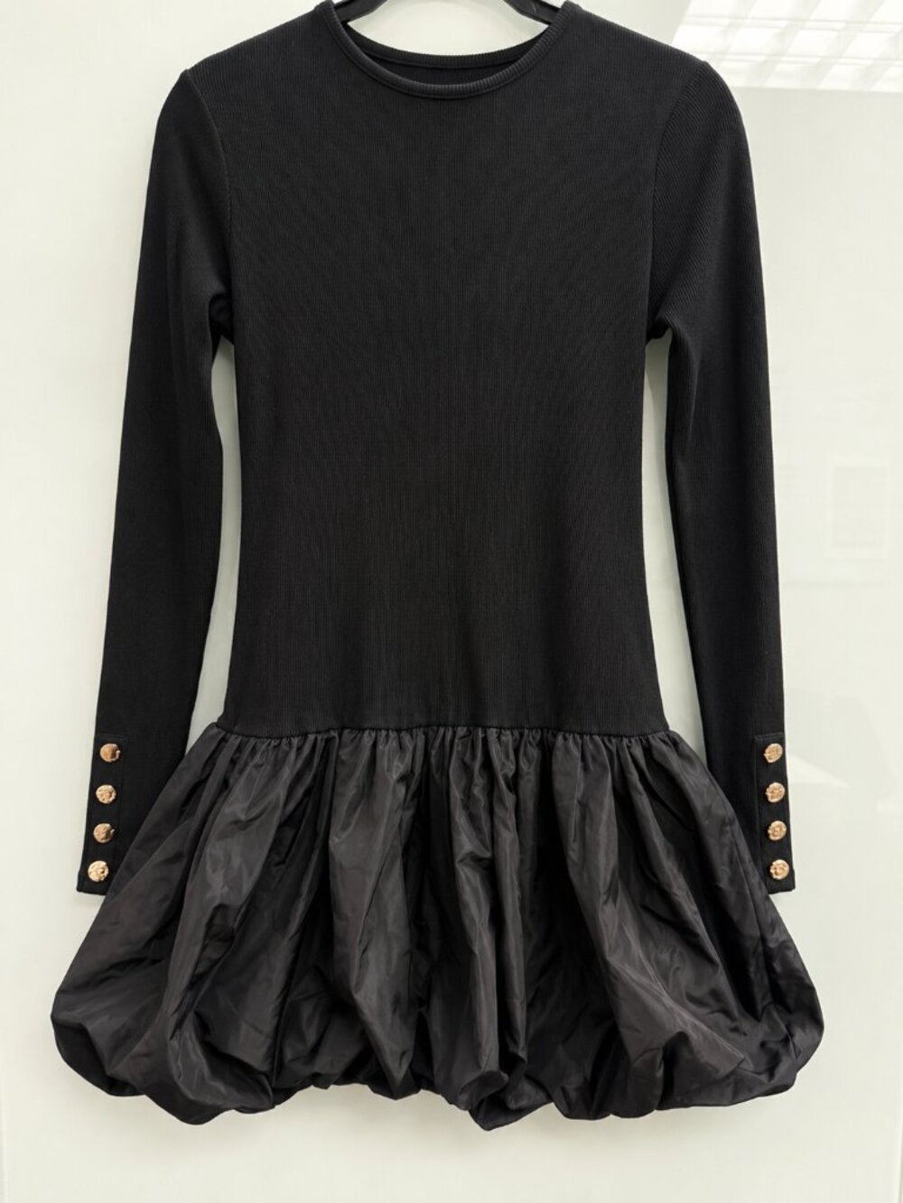 Black long-sleeve bubble hem mini dress